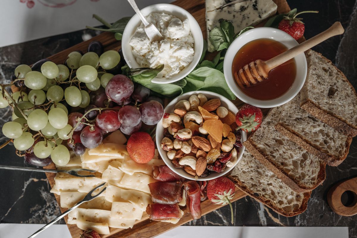 Close up of a catering charcuterie and cheese platter for a private event