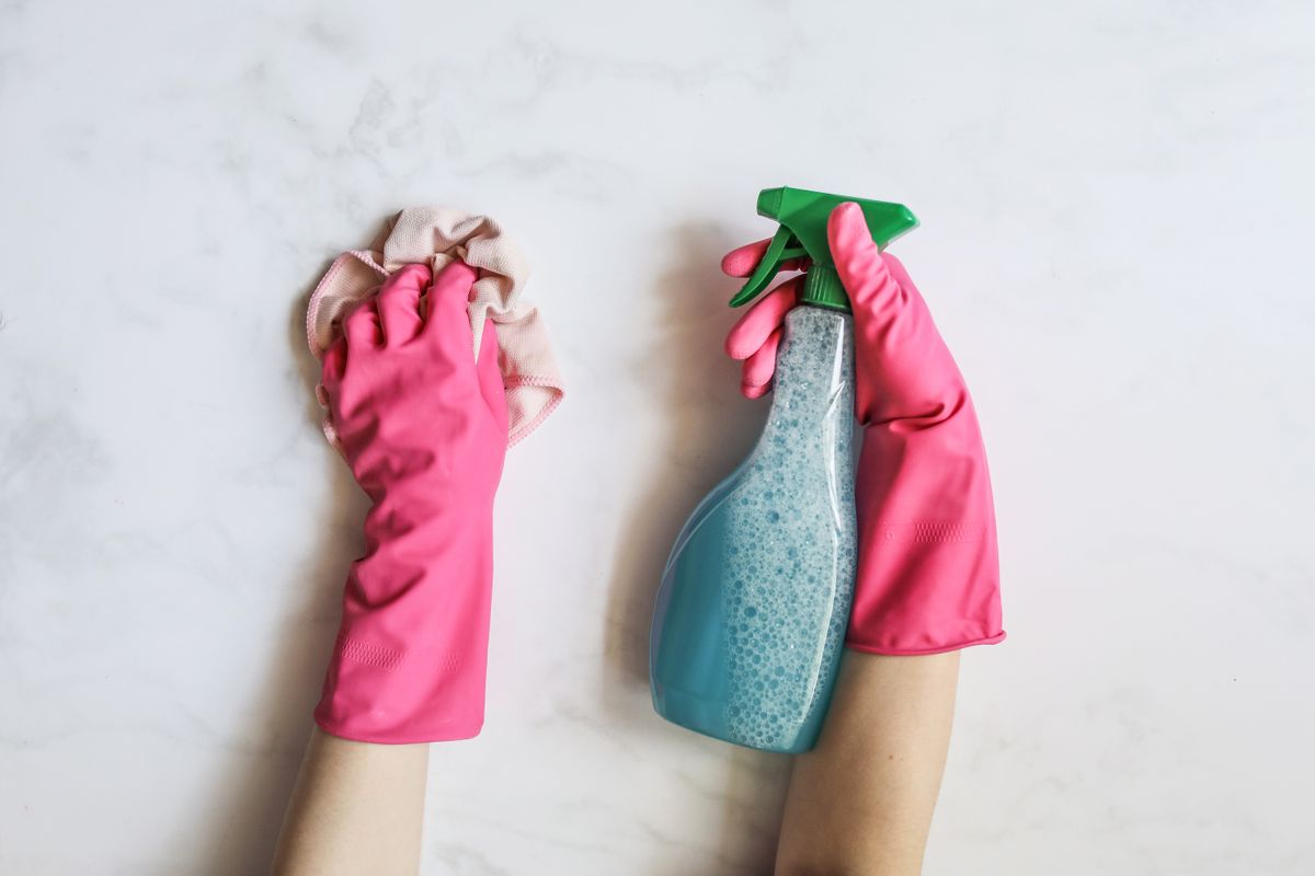 Close-up of cleaning products and spray bottle used for a home clean