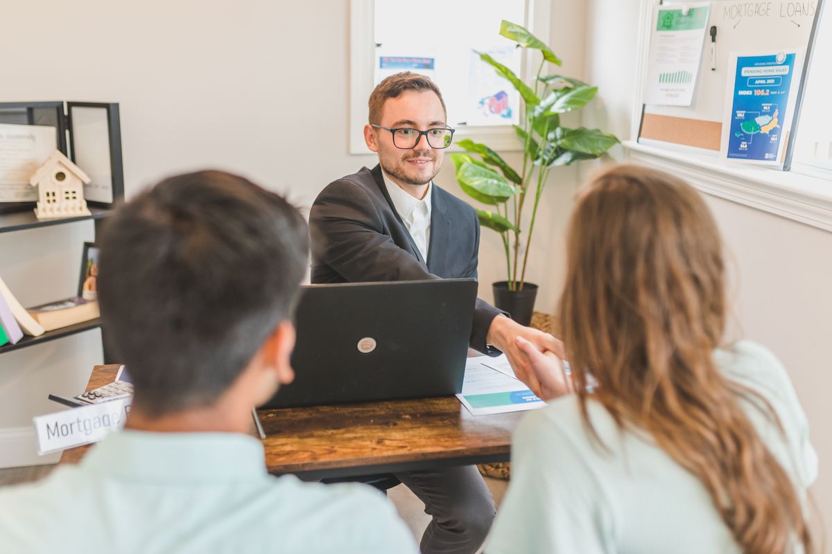Client and insurance broker reaching agreement on commercial cover terms