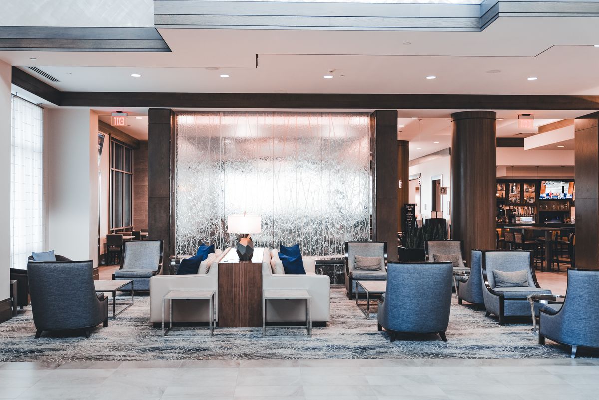 Bright, modern hotel lobby with contemporary seating for guests in Edinburgh