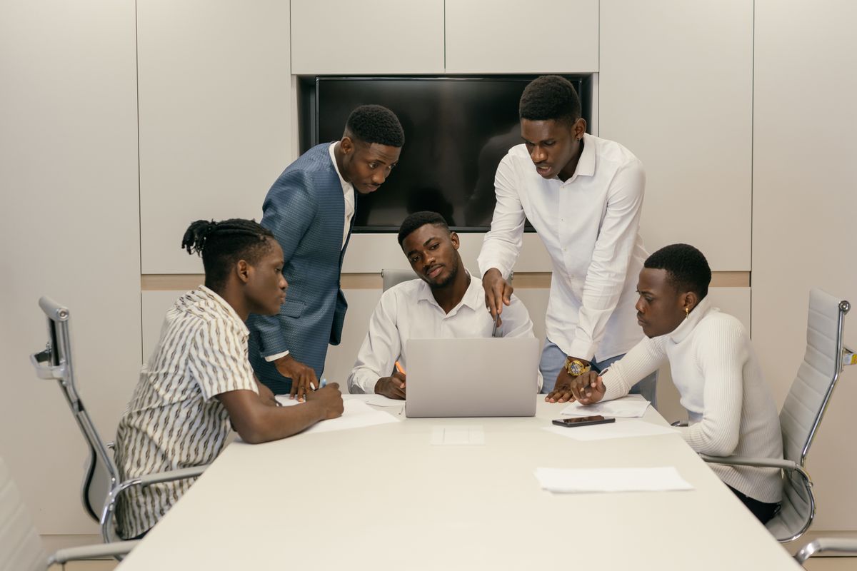 Agency account team presenting search performance results in a client meeting