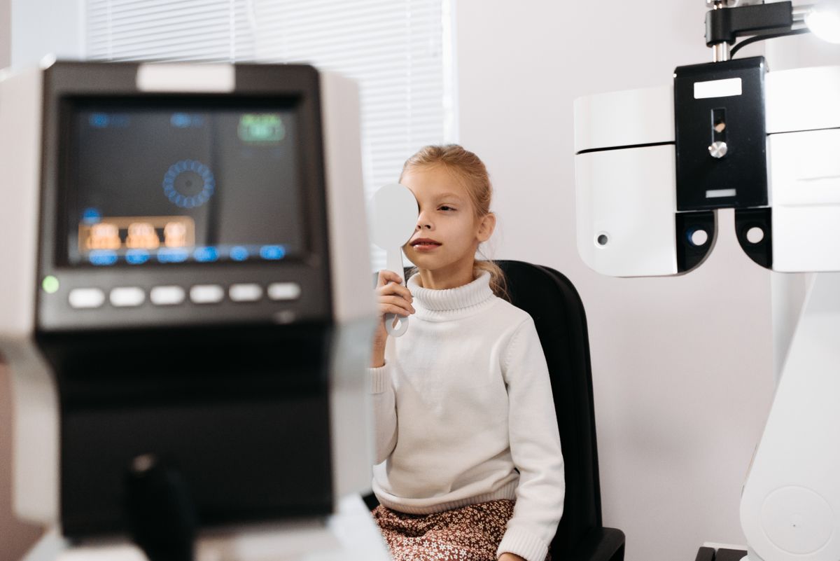 Patient undergoing a vision test as part of a routine eye examination