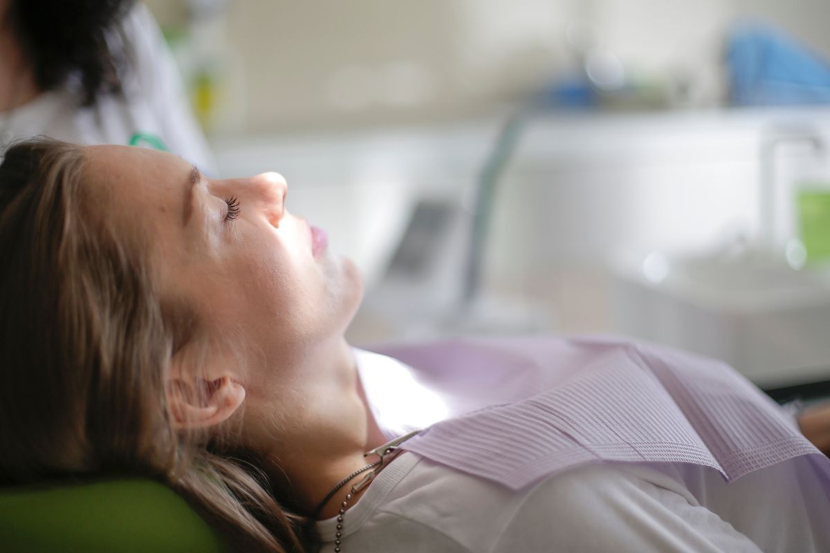 Patient lying in a dental chair during an orthodontic consultation