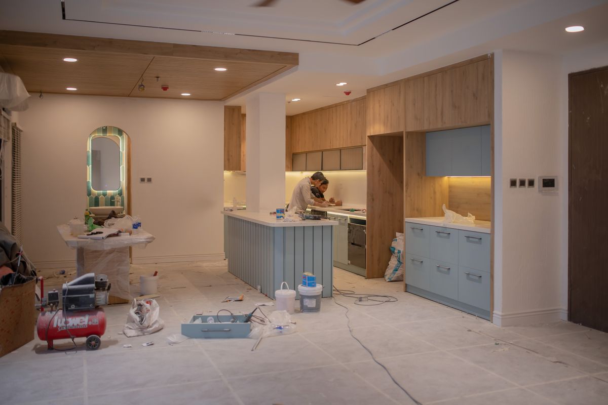 Restoration crew repairing an interior room during a property reinstatement project