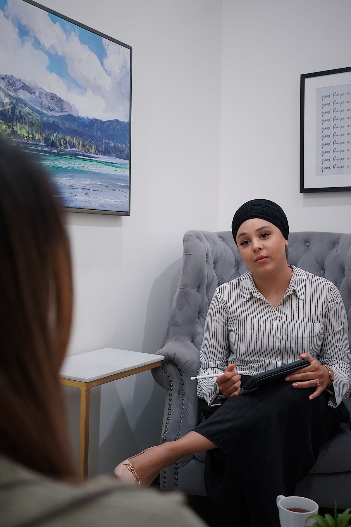 Client talking openly to a psychologist during a one-to-one therapy session