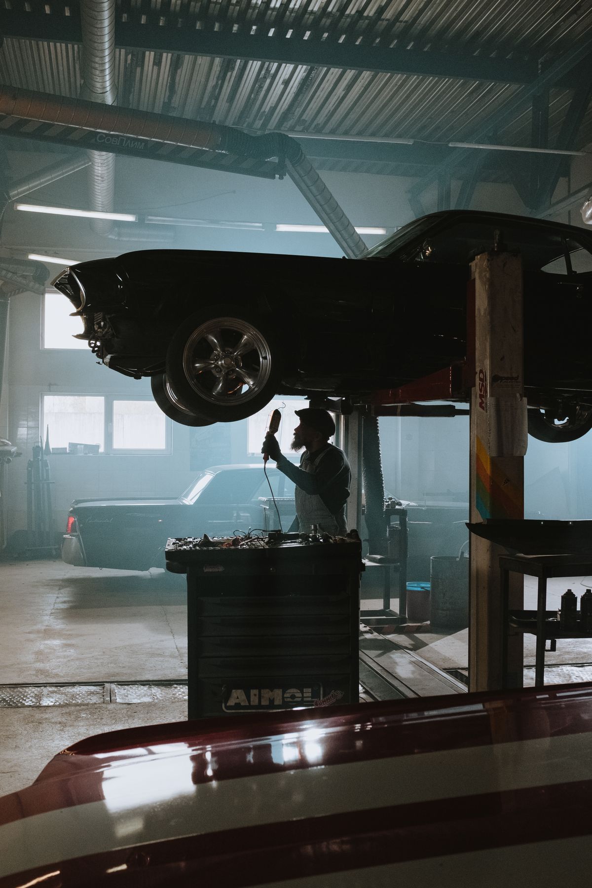 Close-up of an alloy wheel and tyre being serviced in an Edinburgh garage
